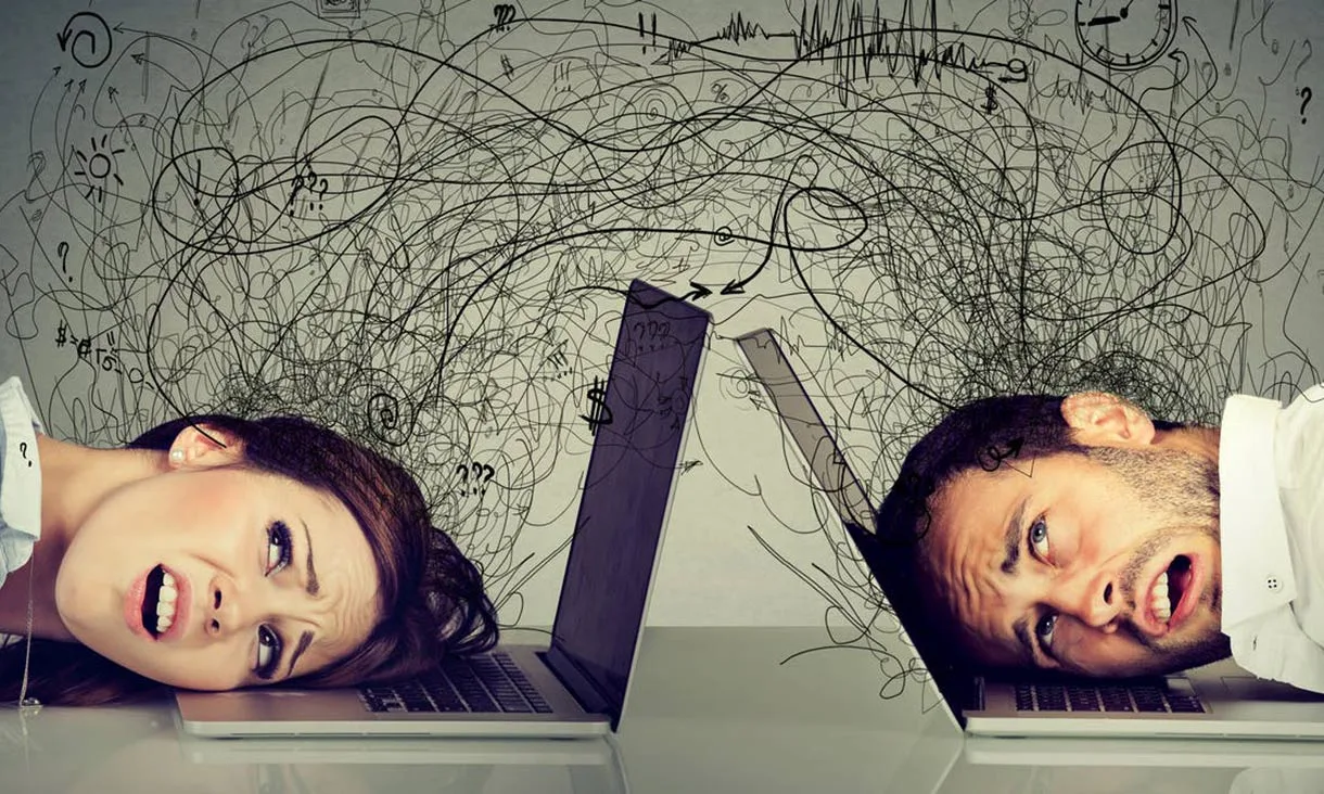digital-overload-1220x732 Digital Overload with two people laying their heads on their computer over whelmed