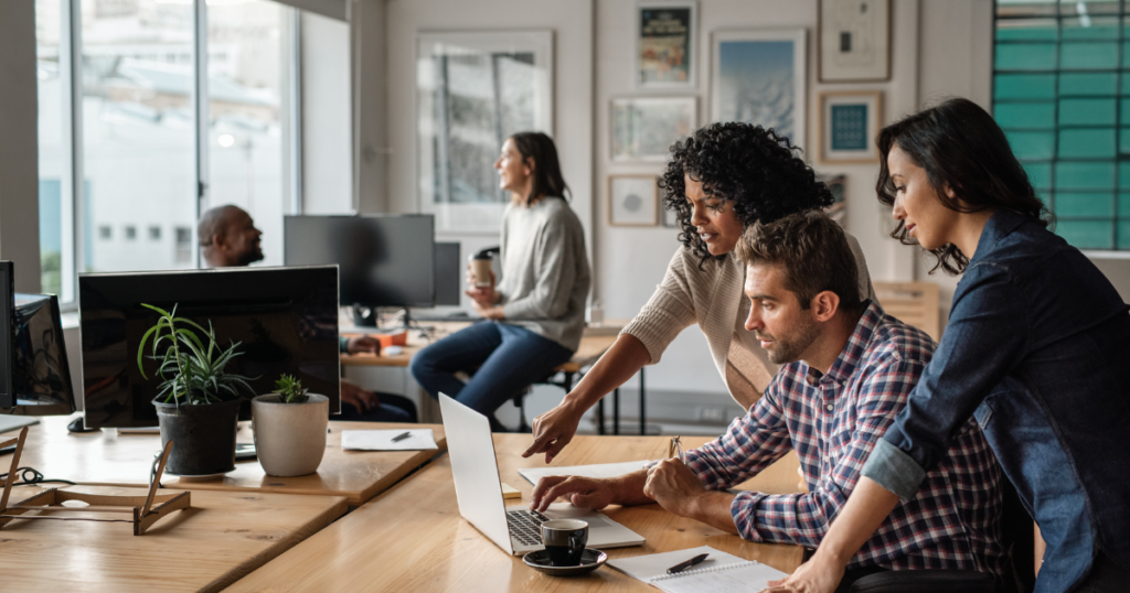 A small business team working on a project in their office.