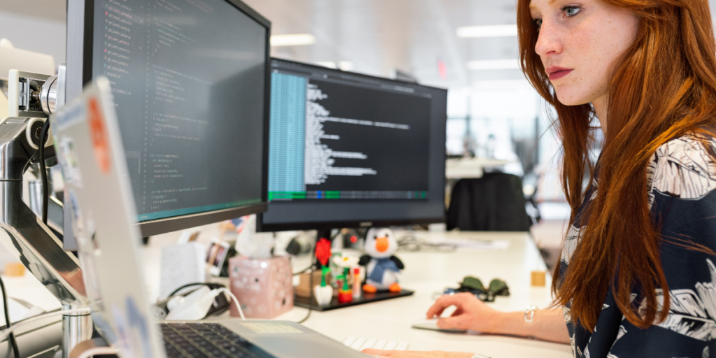 Woman using data protected with privacy-enhancing technologies.