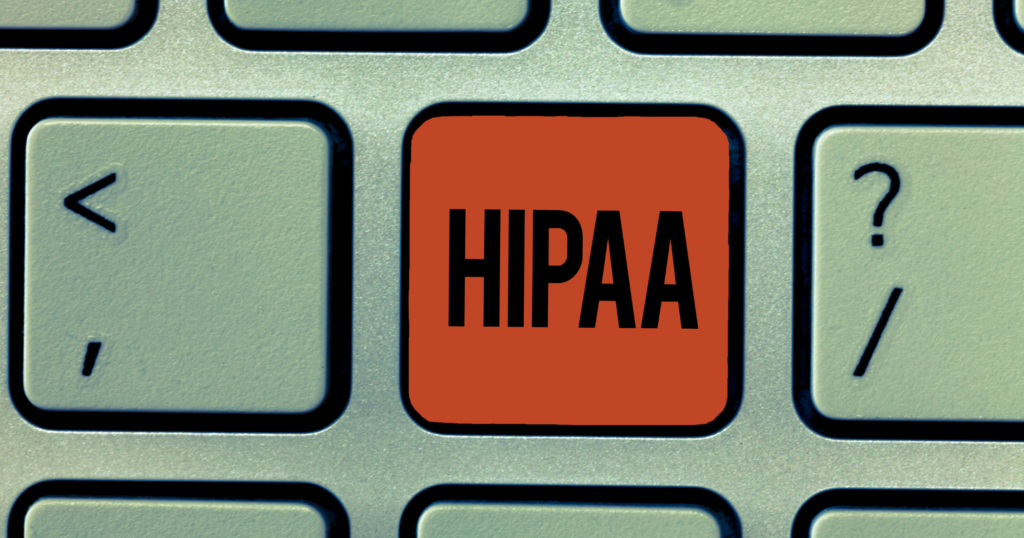 A computer keyboard with a key that says “HIPAA.”