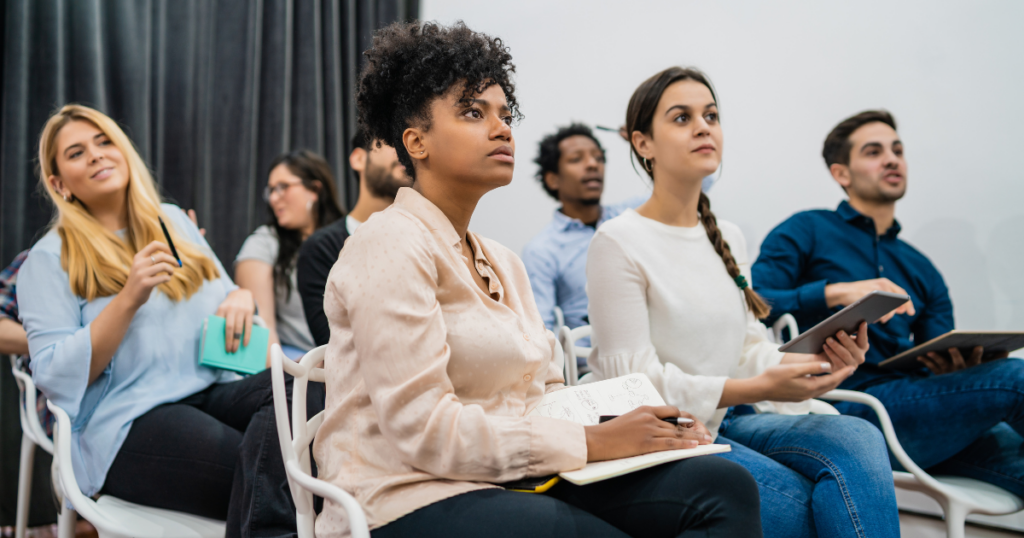 A group of employees in a cybersecurity awareness training program.